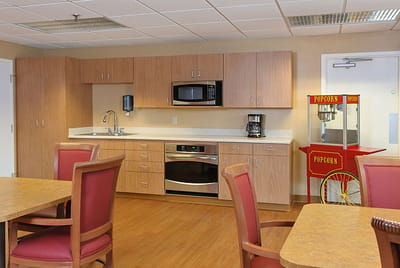 Interior kitchen area with microwave and popcorn machine