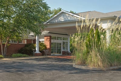 Entrance of The Westchester House with landscaping