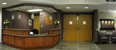 Main lobby reception area with flowers and seating
