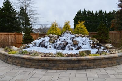Outdoor water feature in a landscaped garden area