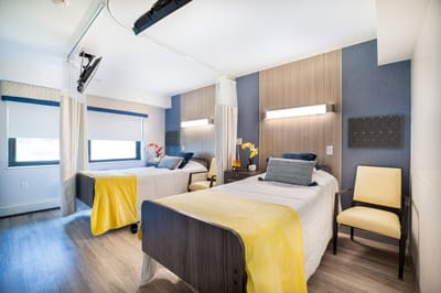 Bright twin bedroom in a nursing facility