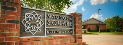 Exterior view of Magnolia Square Nursing facility sign