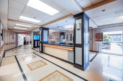 Lobby area with reception desk and seating