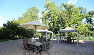 Outdoor seating area with umbrellas and tables