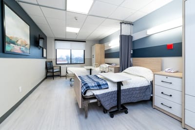 A well-furnished private room in a nursing facility