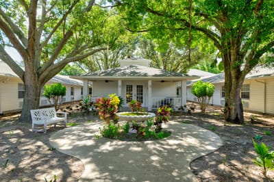 Outdoor garden area with seating and landscaping