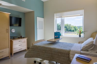 A comfortable private resident room with a view