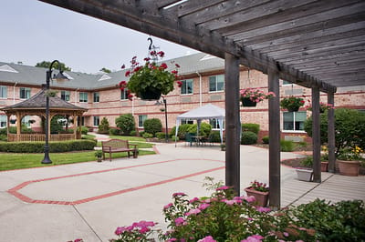 Outdoor courtyard with seating and gazebo