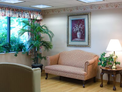Cozy common area with sofa and plants