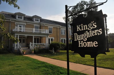 Facade of King's Daughters Home with signage