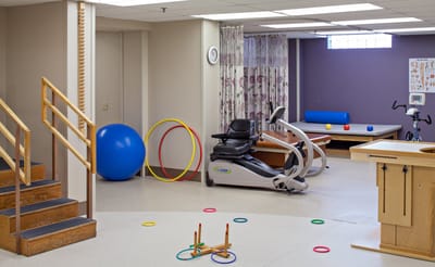 Rehabilitative space with exercise equipment and therapy tools