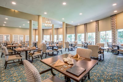 Bright dining room with neatly arranged tables