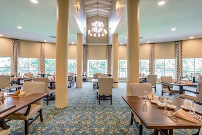 Dining area with tables set for a meal