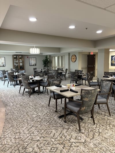 Dining area with neatly arranged tables and chairs