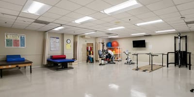 Rehabilitation therapy room with equipment and space