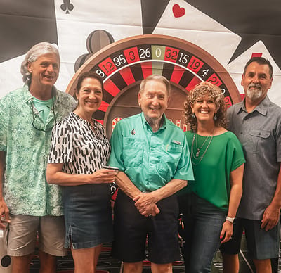 Residents and staff at a casino-themed event