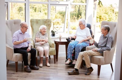 Residents enjoying conversation in a common area