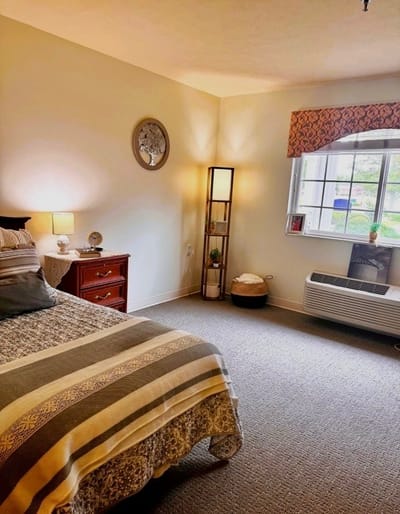 Cozy private resident room with natural light.