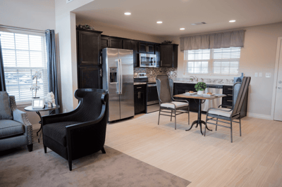 Modern kitchen and dining area in a resident room