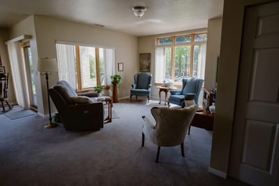 Cozy common area with comfortable seating and natural light.