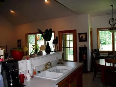 Interior of a kitchen space with seating area