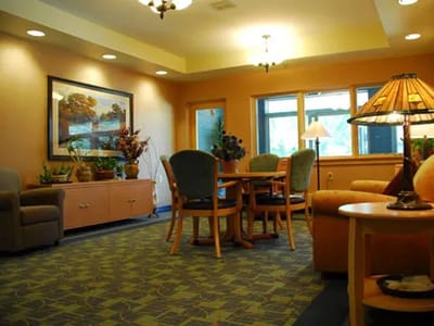 Cozy interior common area with seating and decor.