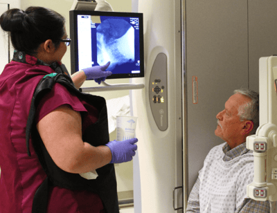 Healthcare staff performing an X-ray procedure