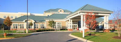 Front exterior of Citizen Care Center with a clear sky.