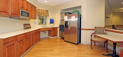 Well-equipped kitchenette area in a facility.