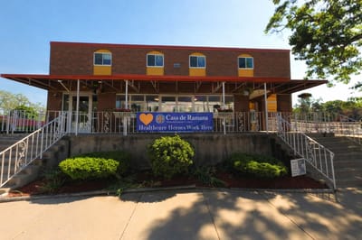 Exterior view of Casa de Ramana with signage