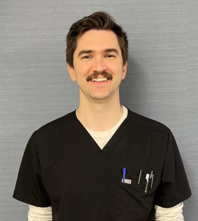 Staff member smiling in a healthcare setting