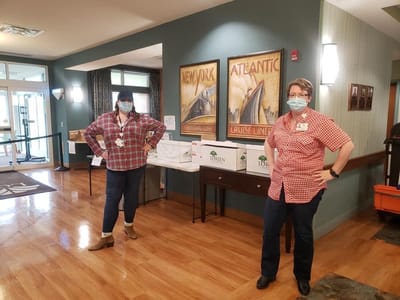 Staff members in a vibrant common area.