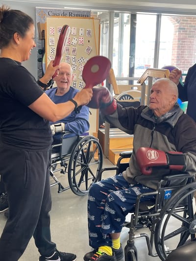 Residents engaged in a therapeutic activity session.