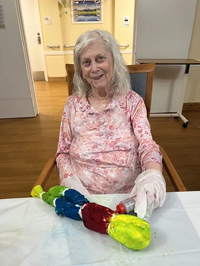Senior woman engaged in an art activity