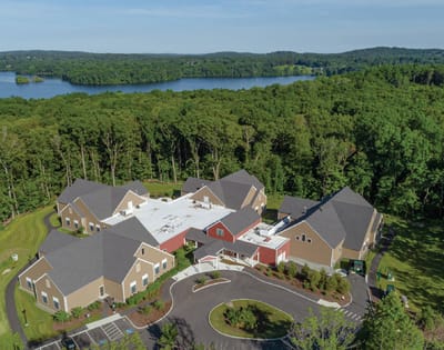 Aerial view of The Meadows Health Center and surrounding nature.