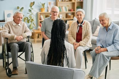 Engaged group discussion in a common area.