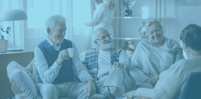Seniors enjoying a cozy conversation indoors