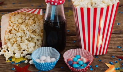 Popcorn and candy in decorative containers