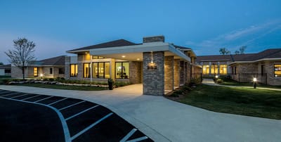 Exterior view of WellBridge of Novi at dusk