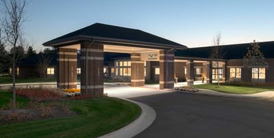 WellBridge facility entrance illuminated at night