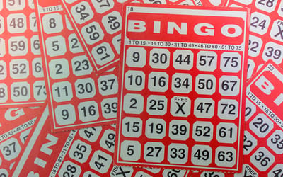 Bingo cards scattered on a table