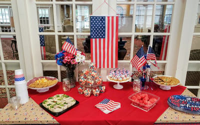 Decorated table with festive snacks and drinks