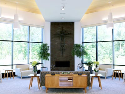 Welcoming lounge area with natural light and seating