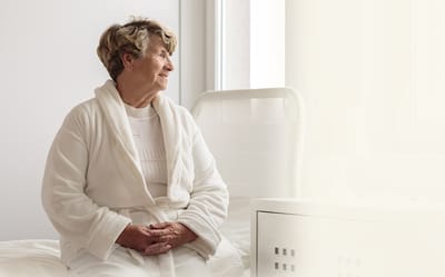 Smiling senior woman in a cozy room