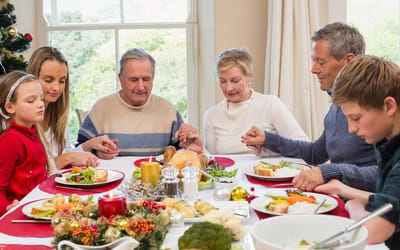 Residents enjoying a meal together during a celebration.