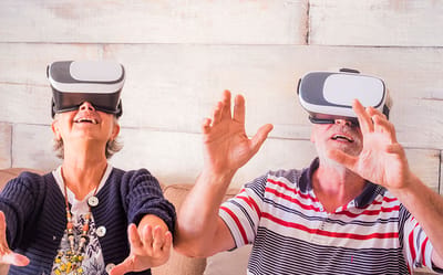 Residents enjoying virtual reality experiences together.