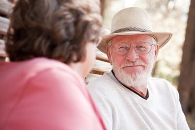 Close-up of a smiling elderly man outdoors