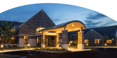 WellBridge of Novi building entrance at dusk