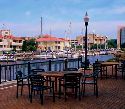 Outdoor seating area overlooking a marina