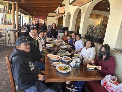 Residents enjoying a meal together in a dining setting.